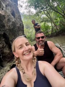 Boat ride through a water cave to a hidden valley in Ninh Binh